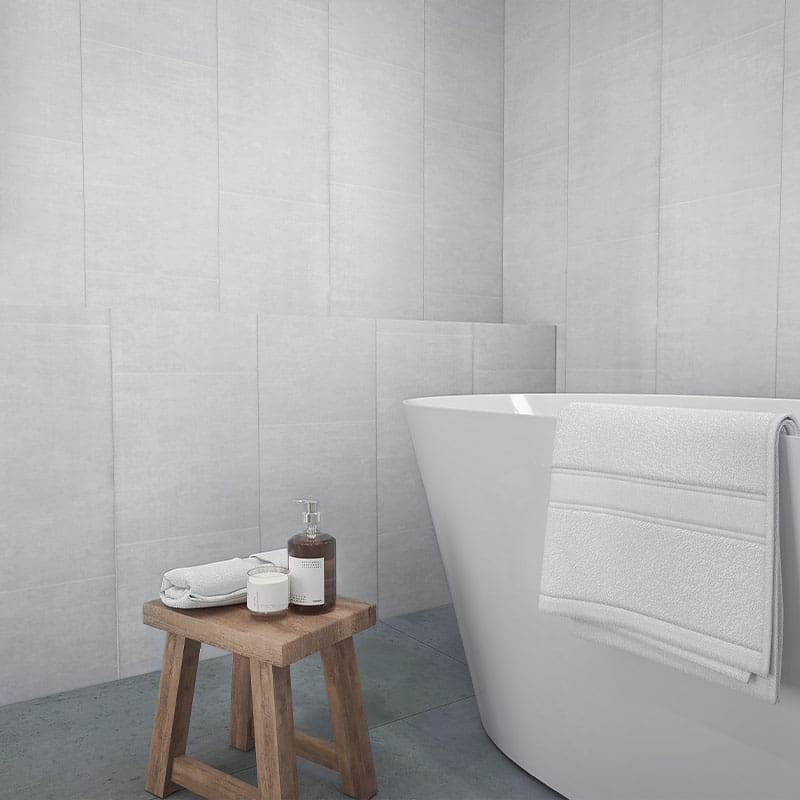 White stone wall panel in bathroom